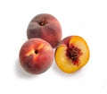 Peaches in Group of Three Ã¢â¬â Bunch of Glossy-Skinned, Smooth, Cut Open, Halved Red and Yellow Peac Royalty Free Stock Photo